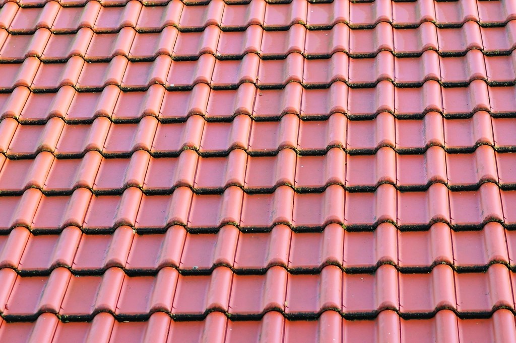 Close-up of new interlocking red roof tiles